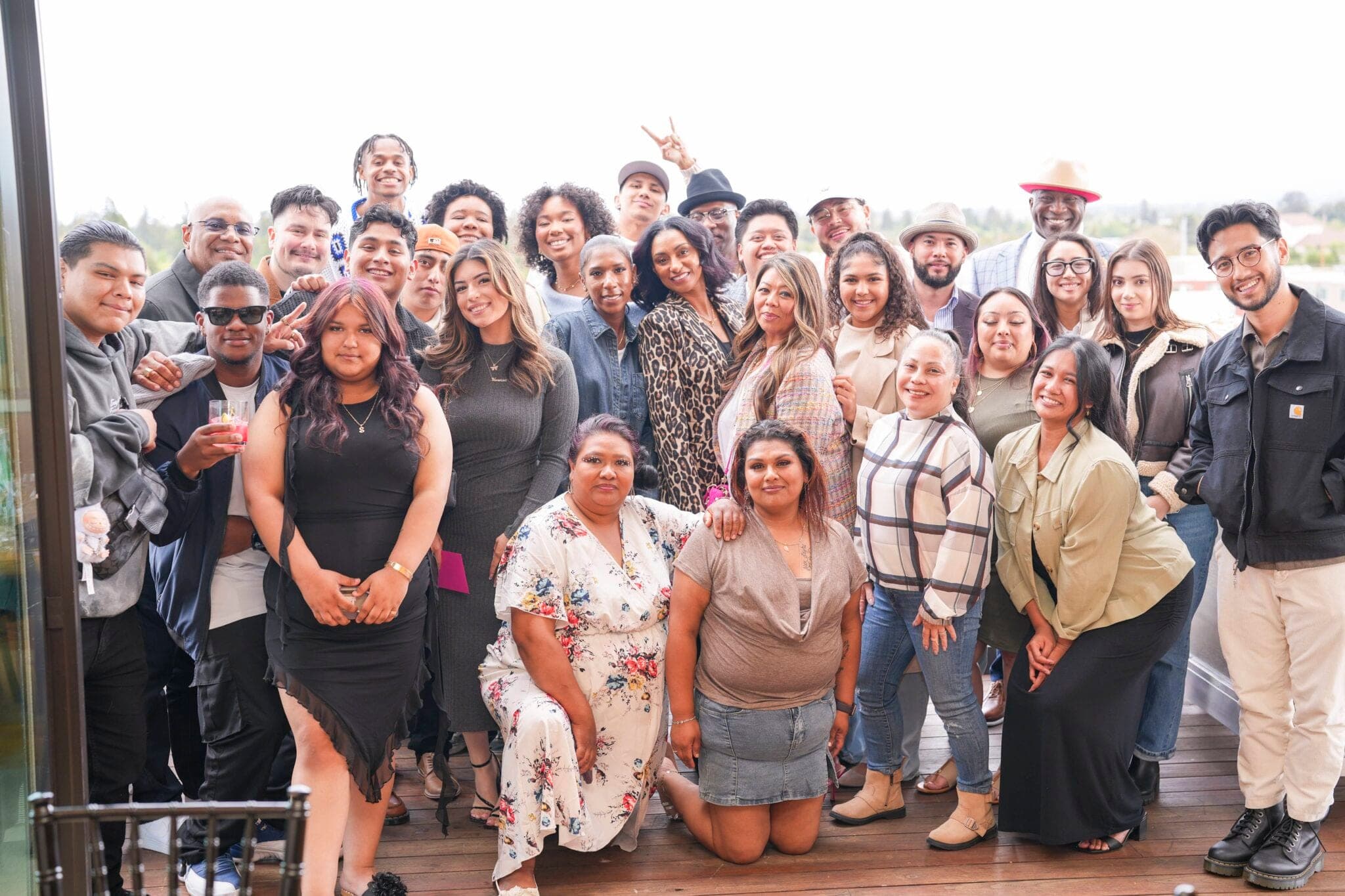The Pinx Catering team gathered together on a Bay Area rooftop deck